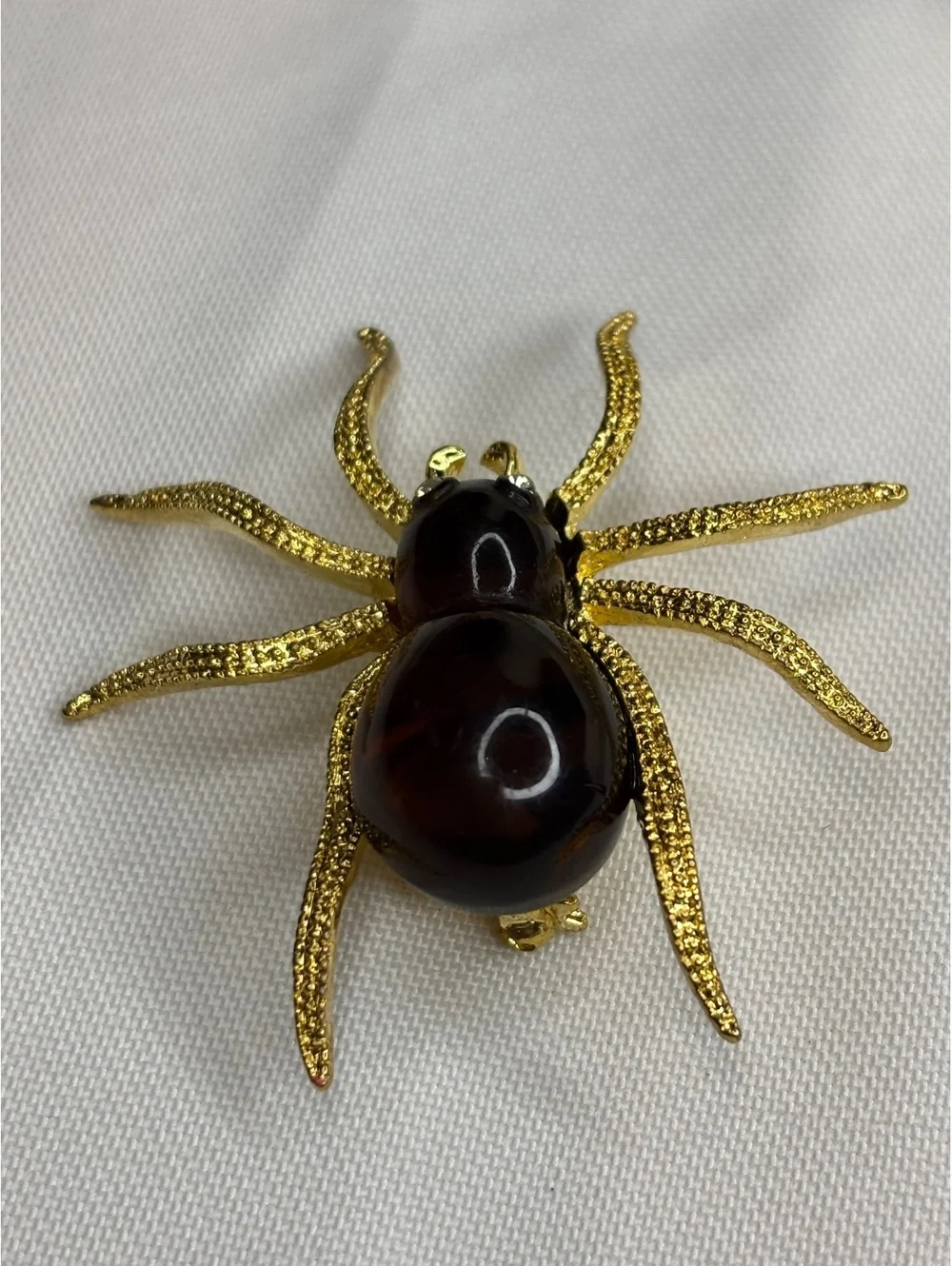 Vintage Lucite Spider Brooch with Gold Tone Legs and Rhinestone Eyes